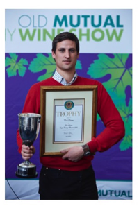 Winemaker Louis van der Riet with the trophy and certificate awarded to De Krans